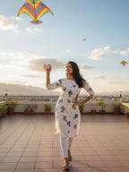 Festive wear Women’s White Cotton Blend Kite Print Kurti