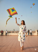 Festive wear Women’s White Cotton Blend Kite Print Kurti