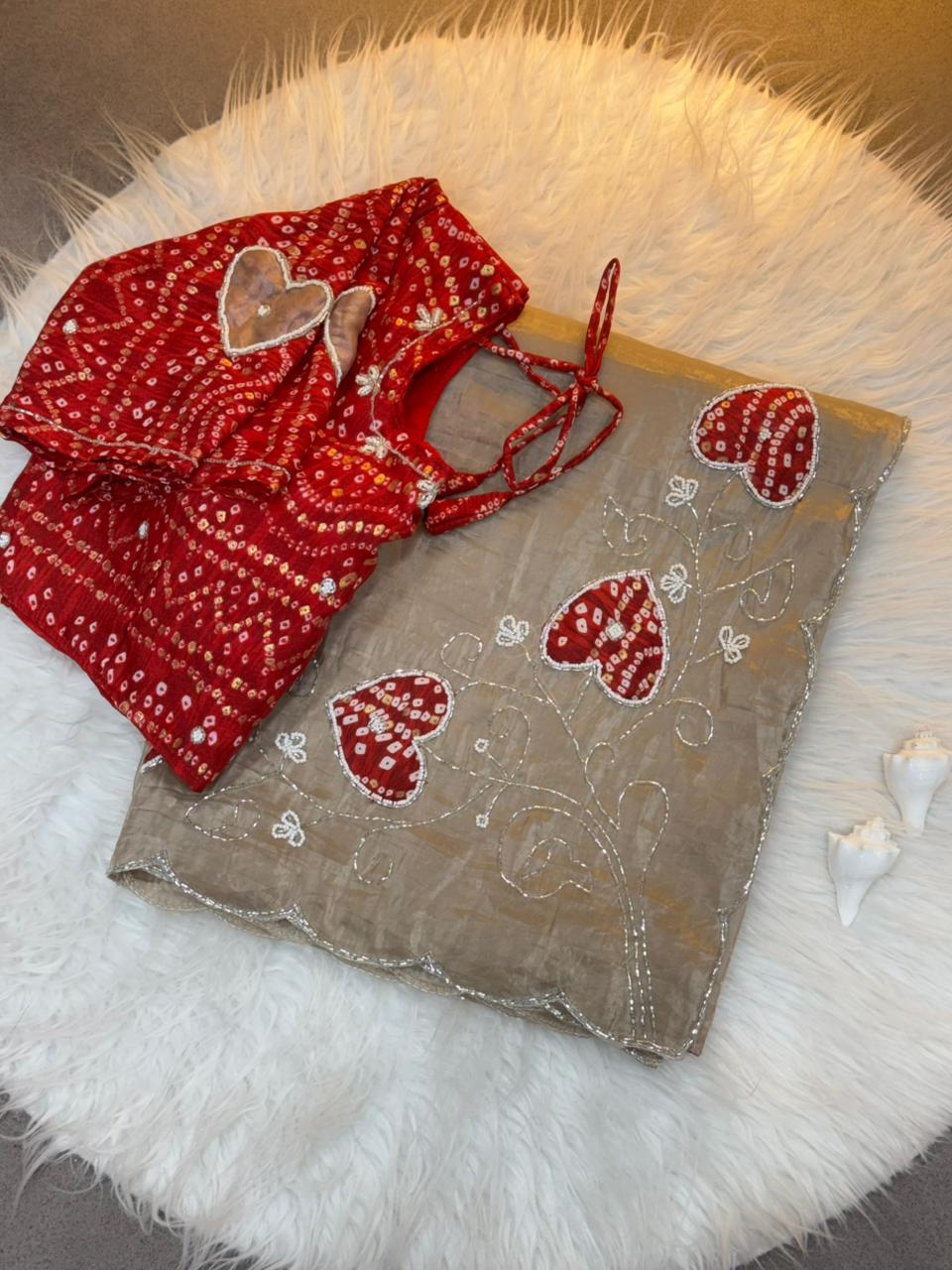 Royal Heart Motif Bandhani Saree with Rich Floral Pallu & Cutdana Embellishments