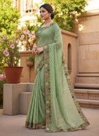 Woman wearing a saree with floral patterns green