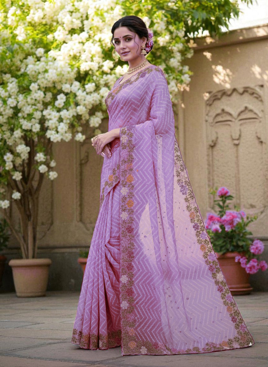 Woman wearing a saree with floral patterns purple