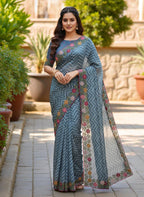 Woman wearing a saree with floral patterns rama