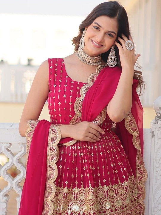 Rani Pink Sharara Set with Heavy Golden Embroidery and Net Dupatta