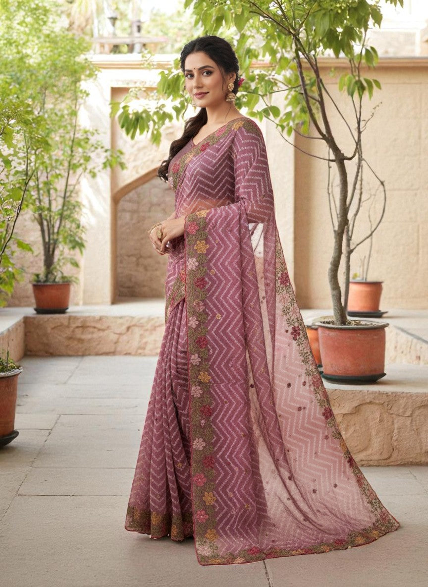 Woman wearing a saree with floral patterns wine