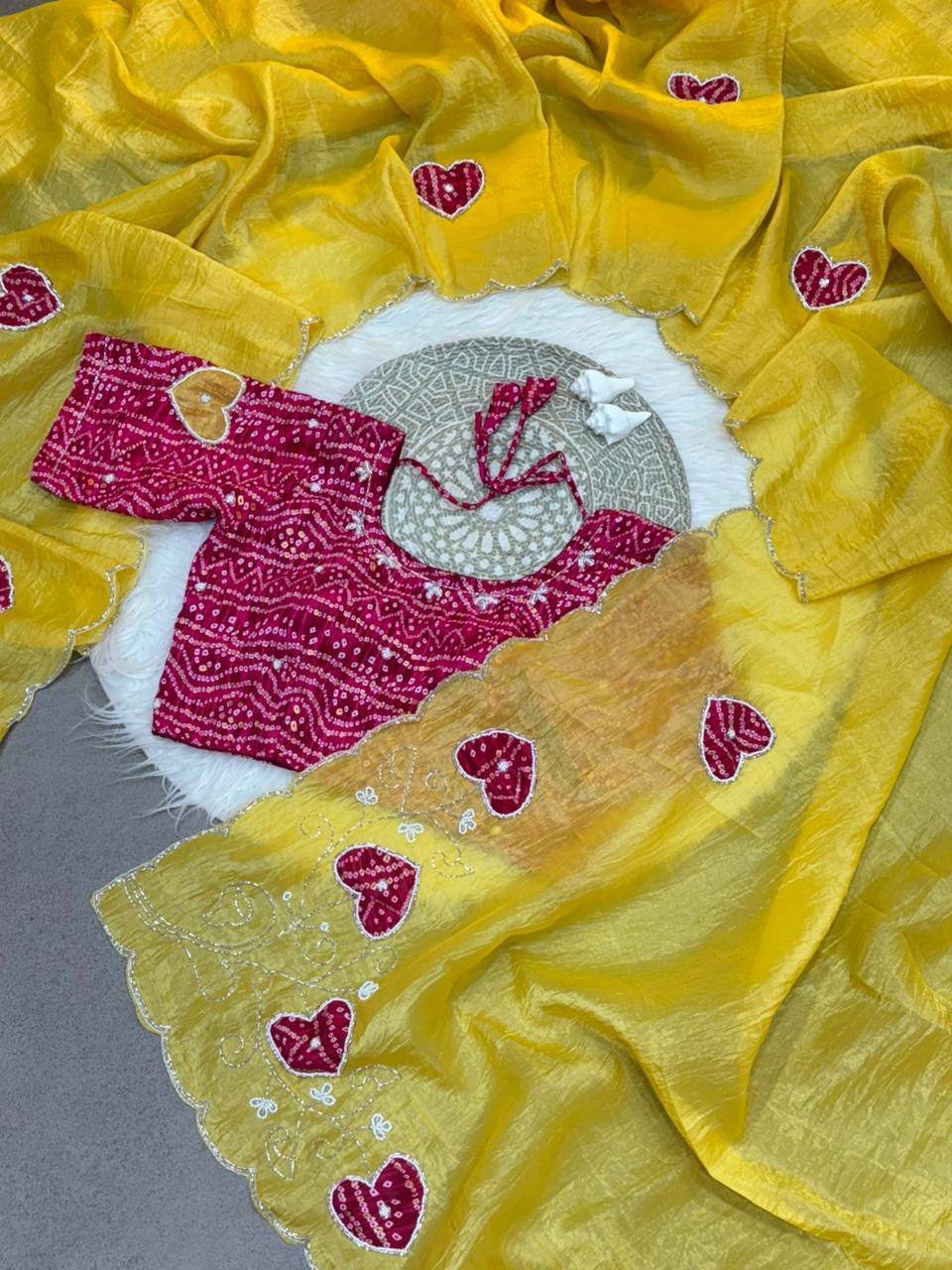 Royal Heart Motif Bandhani Saree with Rich Floral Pallu & Cutdana Embellishments