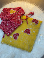 Royal Heart Motif Bandhani Saree with Rich Floral Pallu & Cutdana Embellishments