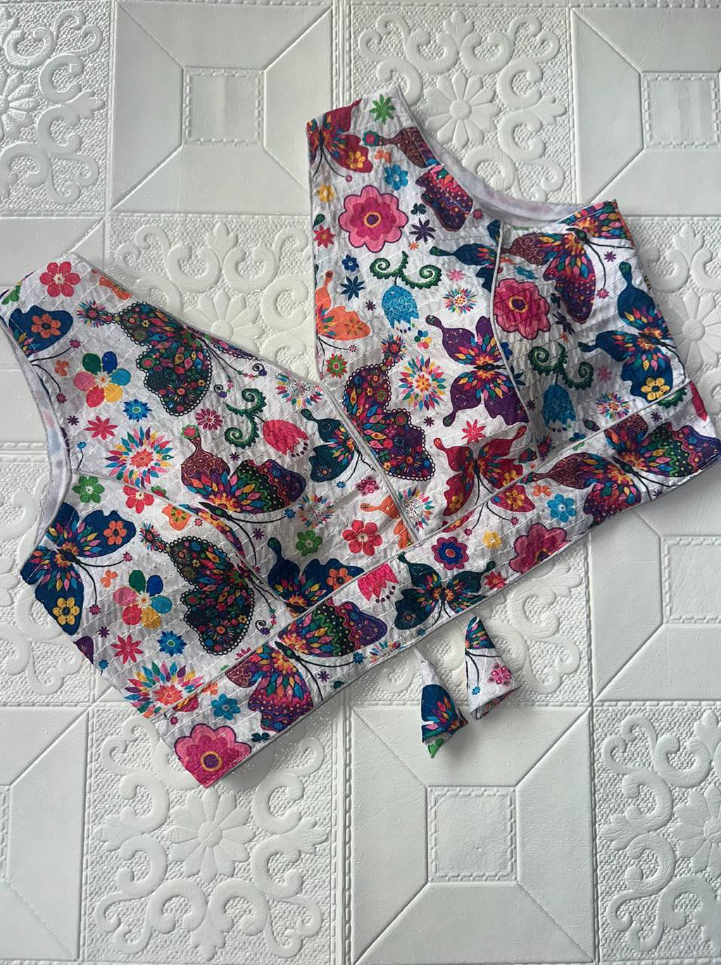 Printed Silk V-Neck Blouse with Back Cut-Out & Tussels