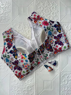 Printed Silk V-Neck Blouse with Back Cut-Out & Tussels